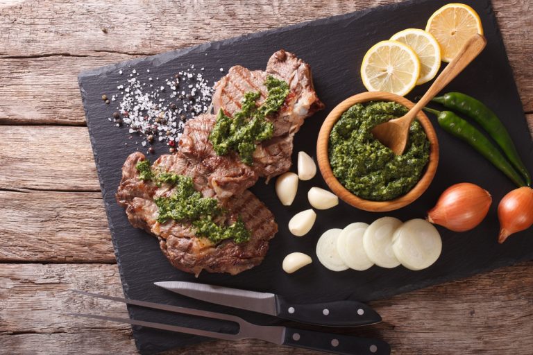 Argentine steaks covered in chimichurri