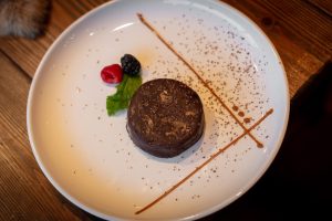 alfajor cookie on a plate at Libertango